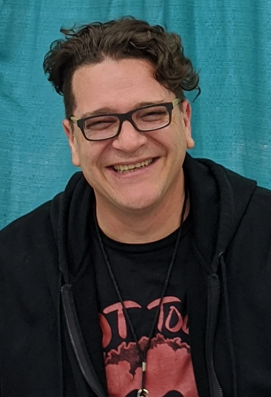 Chris Rager, English voice of King Yemma and Mr. Satan throughout the Dragon Ball franchise